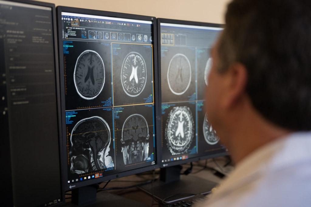 Radiologist reading scans