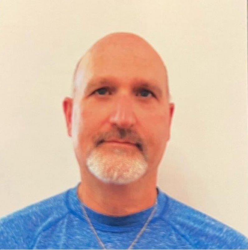 headshot of Maurice Poploski